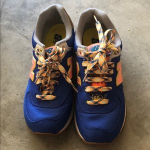 Blue and light pink new balance shoes